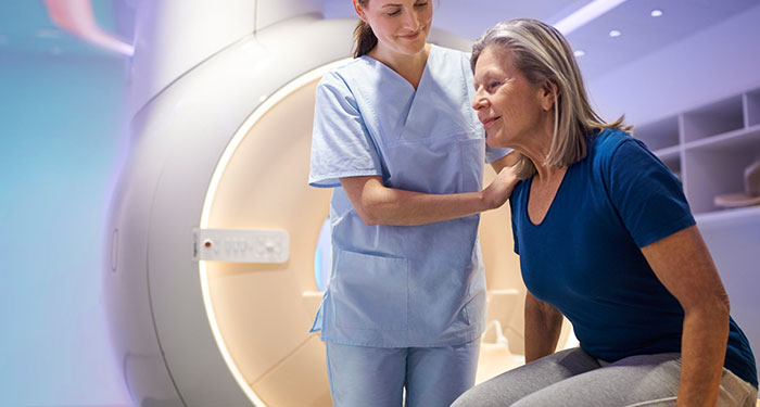 Automatic adjustment of  scan settings  for  MR Conditional implants